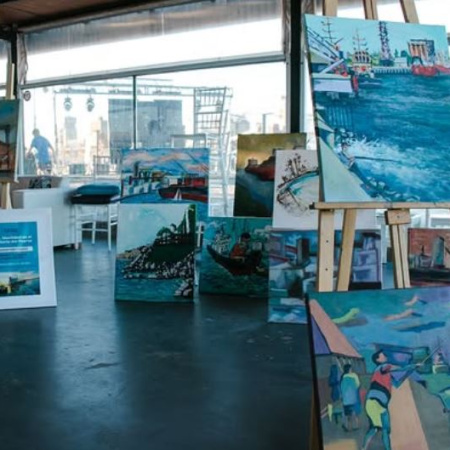 Artistas locales pintaron el paisaje del puerto en una jornada cultural abierta al público
